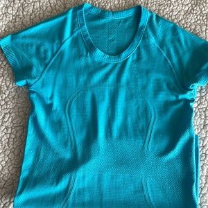 GUC aqua blue lululemon shirt